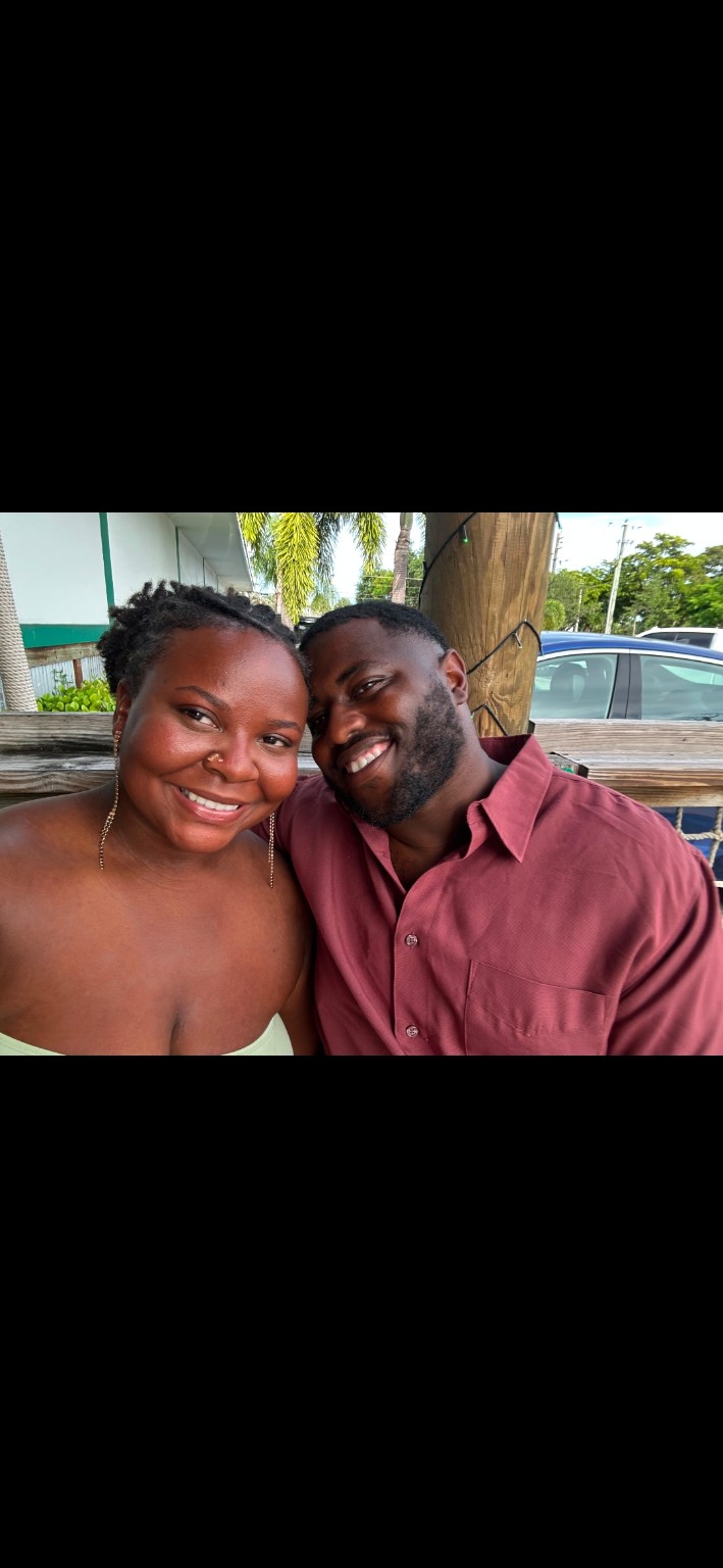 Kaya and her husband Hajjii smiling together